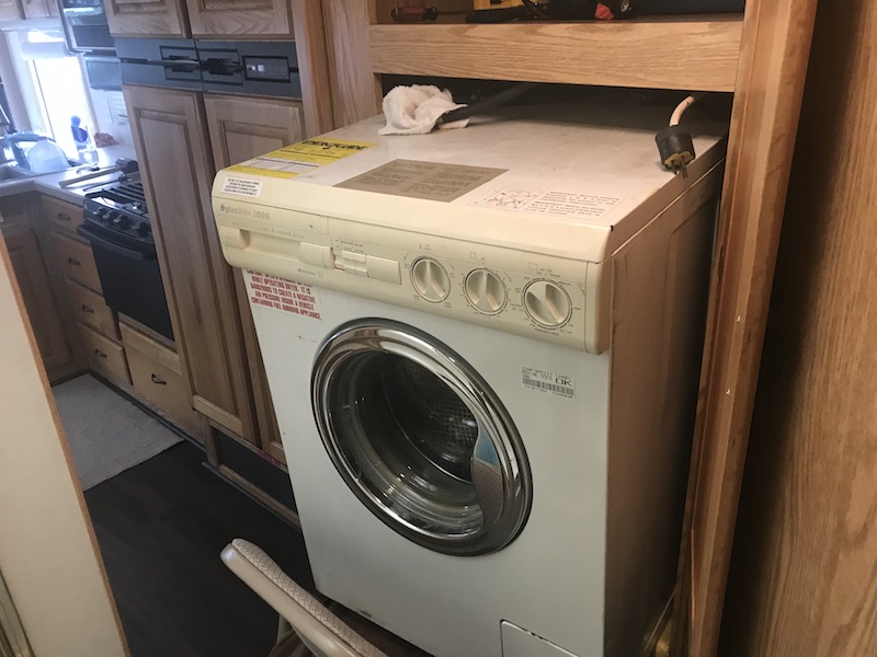 http://www.happilyrv.com/wp-content/uploads/2019/05/rv-washer-dryer-old.jpg